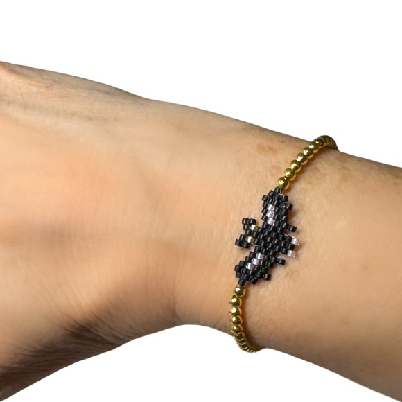 Handcrafted Black and Gold Beaded Bat Stretch Bracelet - Picture 4 of 5